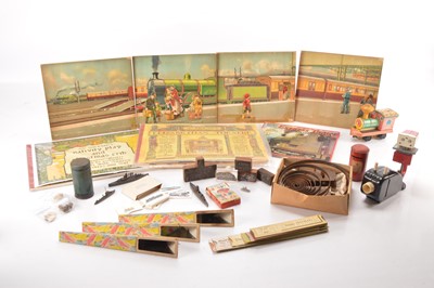 Lot 589 - Collection  of mostly vintage Toys including  Kaleidescopes Post Box Money boxes Taylor and Barrett advertisng printers blocks and Father Tucks vintage and modern Express Train Panoramas and Mr