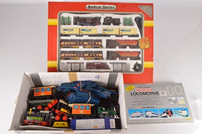 Lot 600 - Collection of boxed and unboxed Toy Trains by various makers and Trix N Gauge 2-6-0 Locomotive and Coach (qty)