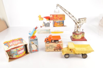 Lot 610 - Tinplate Crane and Chad Valley Drum and various plastic clockwork and battery Toys (7)