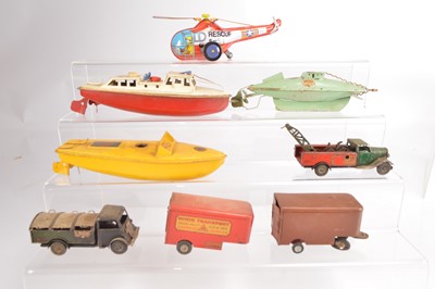 Lot 611 - Three Sutcliffe clockwork Tinplate Boats with four Tri-ang Minic clockwork vehicles/trailers and Chinese Helicopter (8)