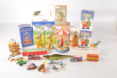 Lot 623 - large collection of boxed and unboxed mostly Chinese clockwork tin toys and smaller many non-mechanical tin toys including Christmas Decorations (30)