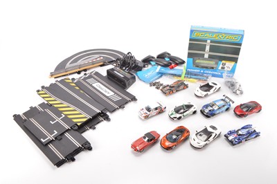 Lot 641 - Large collection of mostly unboxed modern Scalextric including ten cars and large quantity of Track (qty)