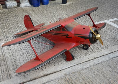 Lot 647 - A large scale wood/plastic construction flying motorised model of a Beechcraft N2100 Bi-Plane