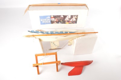 Lot 660 - Bosun Boats by Reeves 42001 Miss Liberty wooden Pond yacht and a  smaller Bowman yacht (2)