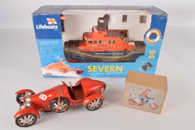 Lot 669 - Radio Controlled Life Boat Tin Racing Car and clockwork Tin Motorcycle (3)