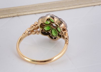 Lot 2 - An Edwardian diamond and demantoid garnet cluster ring