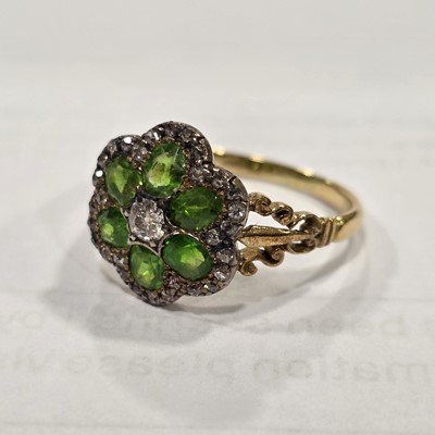 Lot 2 - An Edwardian diamond and demantoid garnet cluster ring