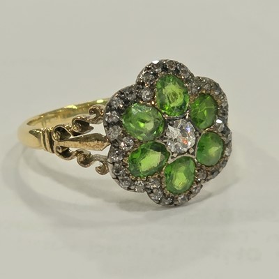 Lot 2 - An Edwardian diamond and demantoid garnet cluster ring