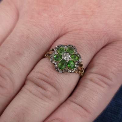 Lot 2 - An Edwardian diamond and demantoid garnet cluster ring