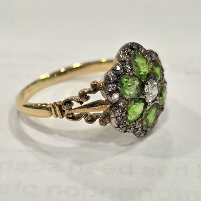 Lot 2 - An Edwardian diamond and demantoid garnet cluster ring