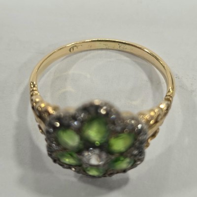 Lot 2 - An Edwardian diamond and demantoid garnet cluster ring