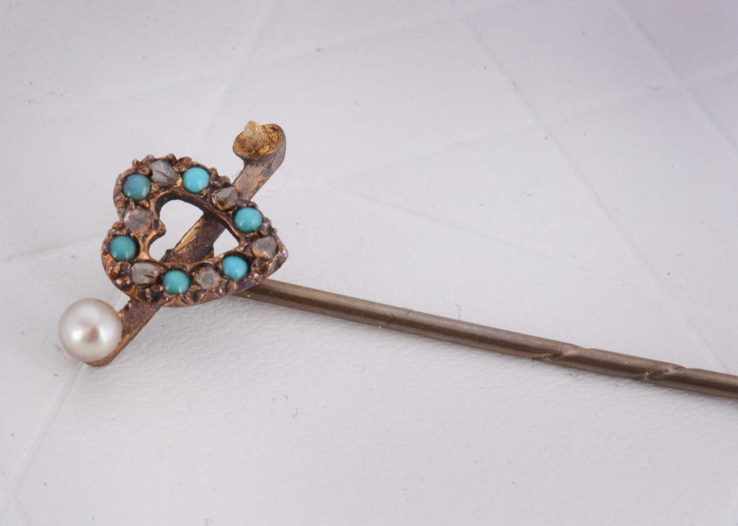 Lot 4 - A 15ct gold turquoise and rough diamond and seed pearl heart shaped stick pin