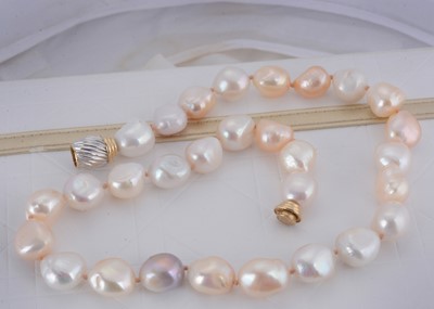 Lot 23 - A string of fireball cultured pearls
