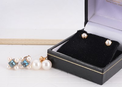 Lot 33 - A pair of topaz and pearl silver set ear studs