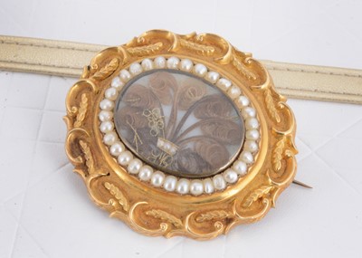 Lot 41 - A large 19th Century oval shaped mourning brooch