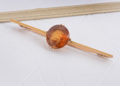 Lot 55 - A 9ct gold citrine bar brooch
