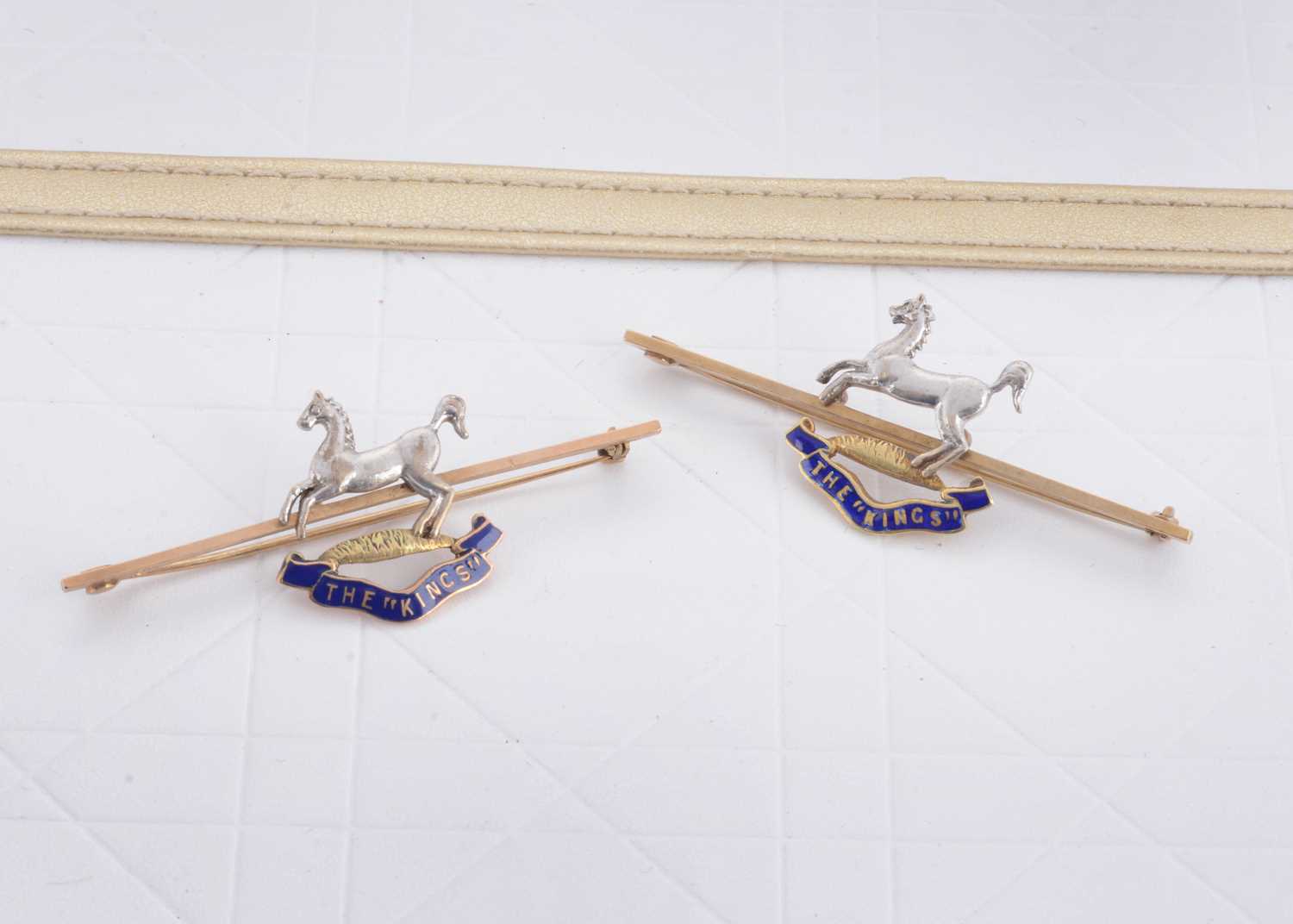 Lot 56 - Two 9ct gold sweetheart brooches