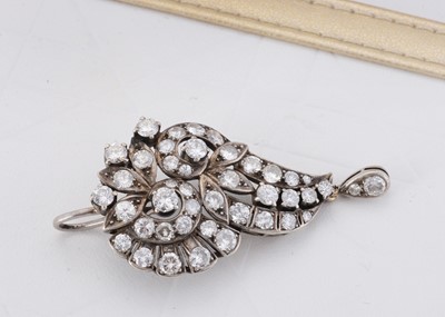 Lot 68 - An Indian diamond set floral drop pendant