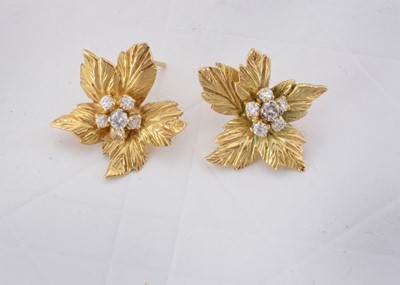 Lot 69 - A pair of Kutchinsky 18ct gold and diamond leaf earrings