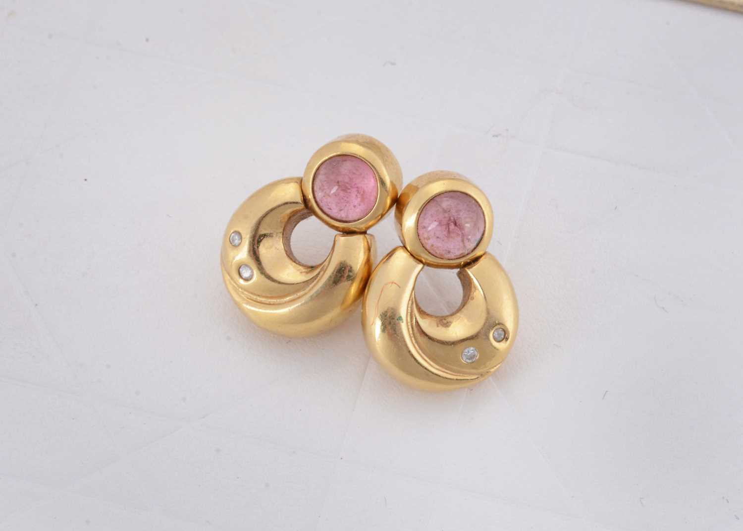 Lot 71 - A pair of continental yellow metal rose quartz and diamond drop earrings