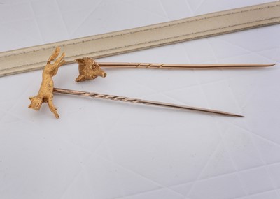 Lot 73 - Two hunting yellow metal stick or stock pins