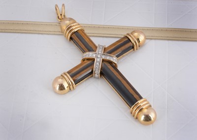 Lot 77 - A tiger's eye and 14ct gold diamond set cross pendant