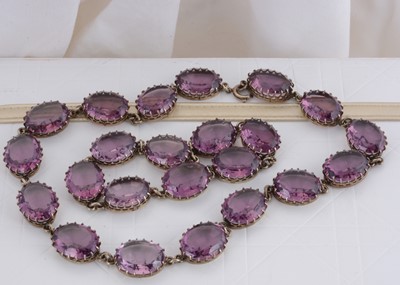 Lot 79 - A white metal and mauve paste necklace and bracelet set