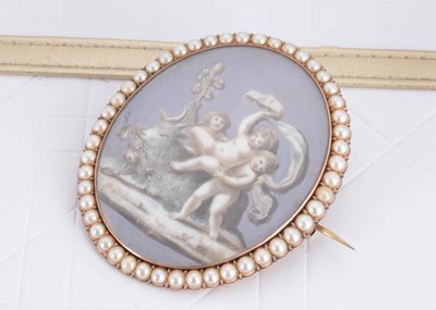 Lot 100 - A late 18th or early 19th Century oval seed pearl framed brooch