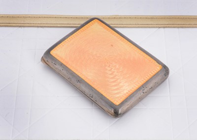 Lot 103 - An art deco silver and enamel rectangular compact