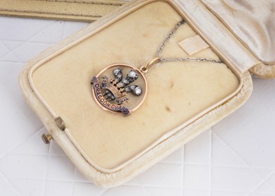 Lot 107 - A regimental sweetheart diamond and enamel platinum, silver and gold pendant