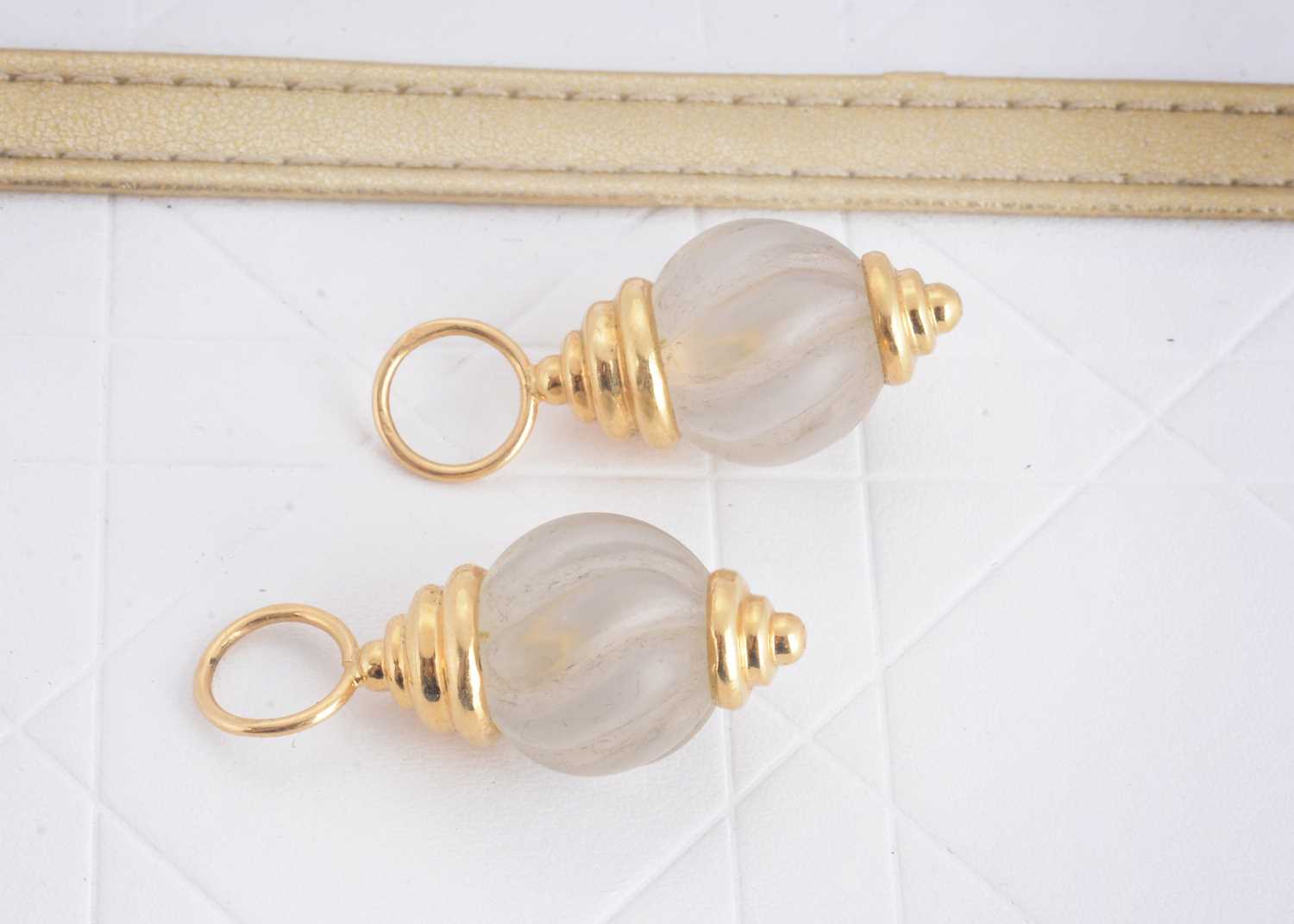 Lot 110 - A pair of continental and frosted glass 18ct gold acorn stylised drops