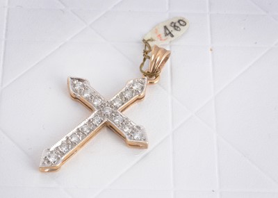 Lot 126 - A 9ct gold diamond set cross pendant