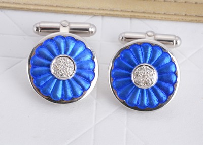 Lot 127 - A pair of contemporary silver and enamel cufflinks