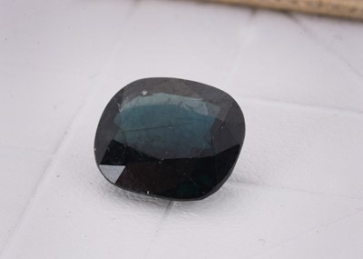 Lot 139 - A mixed cushion cut loose sapphire