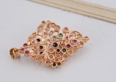 Lot 144 - A continental multi gem set navette shaped pendant