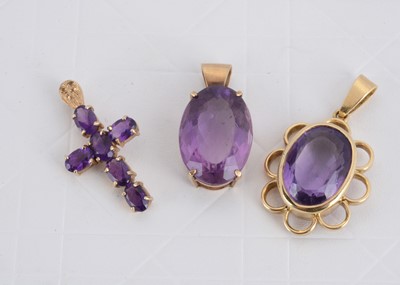 Lot 149 - Three gold amethyst pendants