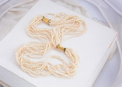 Lot 159 - A freshwater multi strand pearl necklace and bracelet