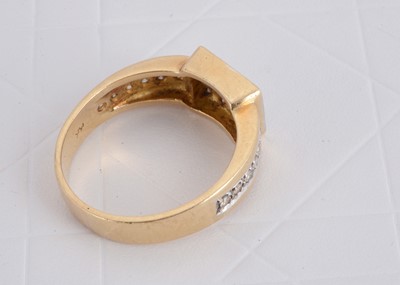 Lot 168 - A continental yellow metal 14k stamped diamond set signet ring