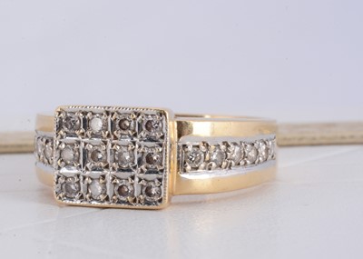 Lot 168 - A continental yellow metal 14k stamped diamond set signet ring
