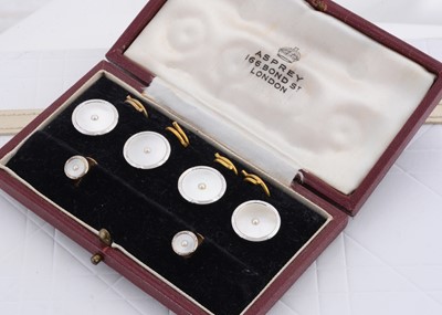 Lot 205 - An Asprey London cased dress set