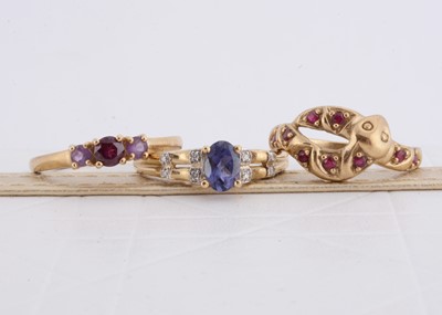 Lot 213 - Three gem set dress rings