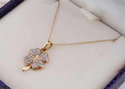 Lot 223 - A 14ct diamond set four leaf clover pendant and chain
