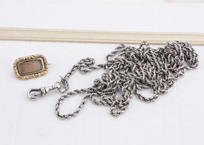 Lot 229 - A 19th Century cushion shaped gilt metal mourning brooch