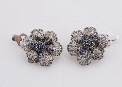 Lot 237 - A pair of Ukrainian 14ct white gold sapphire and diamond clip and pin earrings