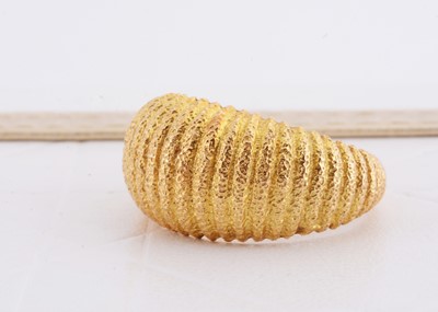 Lot 240 - A continental yellow metal bombe shaped textured dress ring