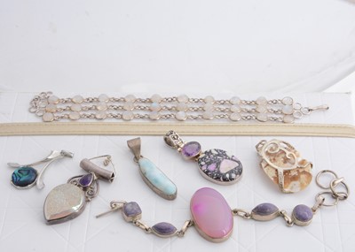 Lot 278 - A collection of modern silver gem set pendants and bracelets