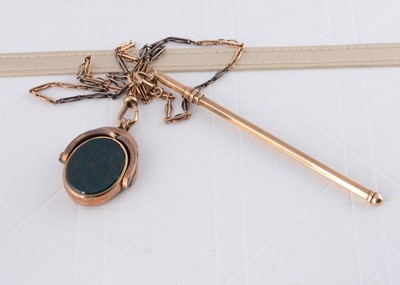 Lot 294 - An art deco 9ct gold swizzle stick