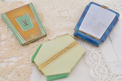 Lot 317 - Three Art Deco wedge shape compacts