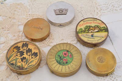 Lot 320 - Made in Ladye Fayre England circular brass compact