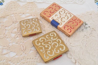 Lot 333 - Three gilt metal Yardley enamel feather decorated compacts